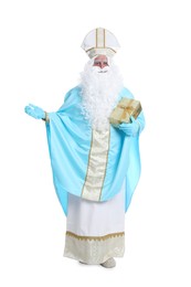 Photo of Full length portrait of Saint Nicholas with present on white background