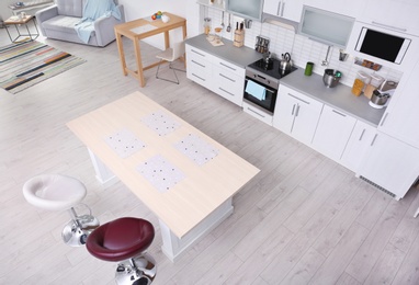 Photo of Modern kitchen interior, view through CCTV camera