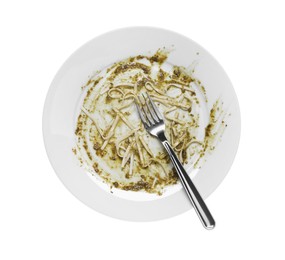 Dirty plate and fork on white background, top view