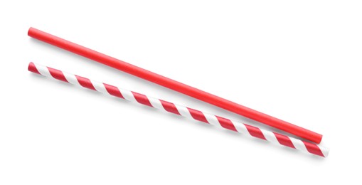 Photo of Different paper cocktail straws on white background