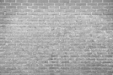 Texture of light grey color brick wall as background