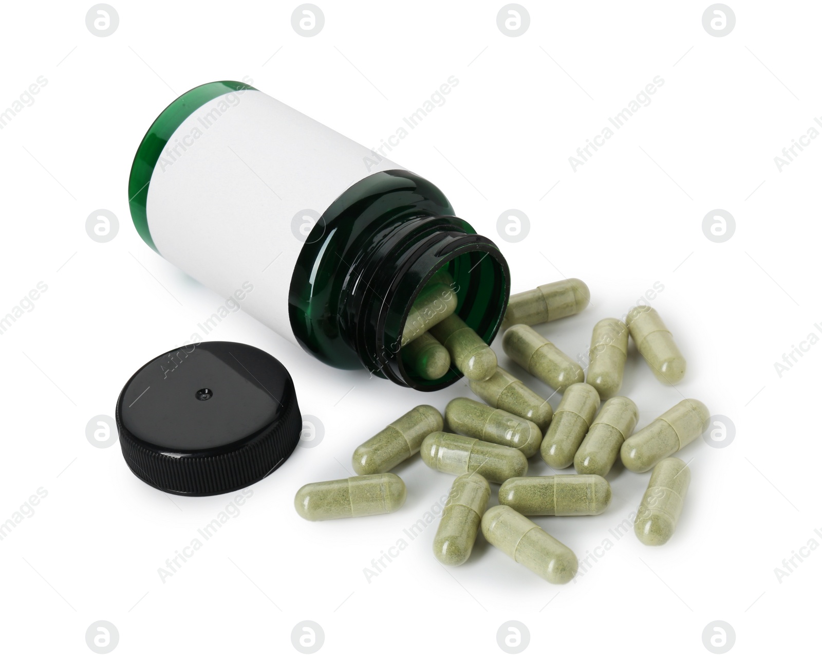 Photo of Scattered vitamin capsules and bottle isolated on white