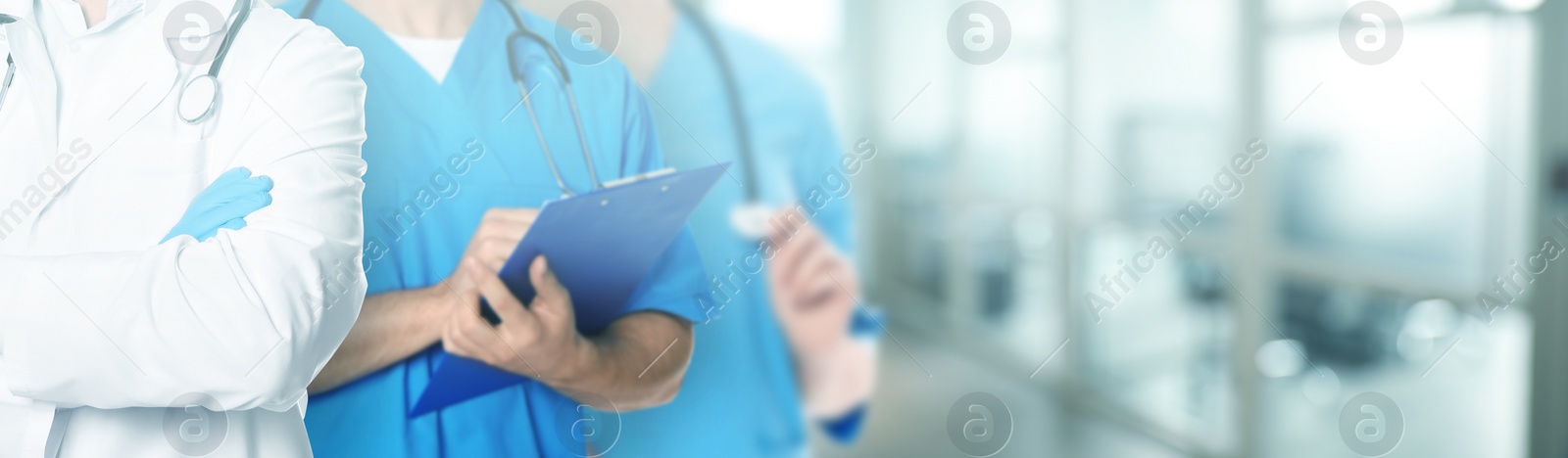 Image of Doctors and nurse in hospital, closeup. Banner design with space for text