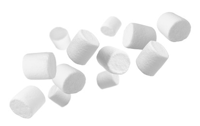Image of Delicious sweet puffy marshmallows flying on white background