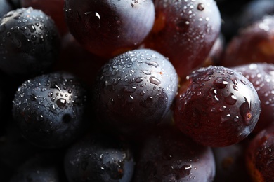 Bunch of fresh ripe juicy grapes as background, closeup