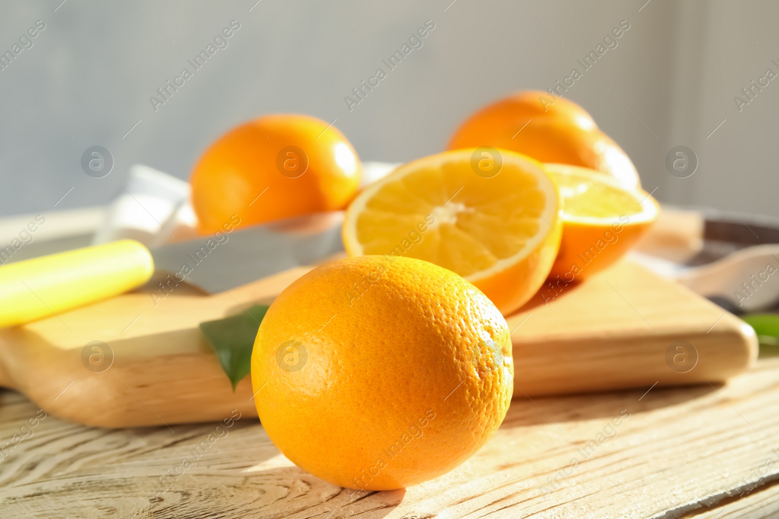 Photo of Fresh juicy oranges on wooden table. Healthy fruits