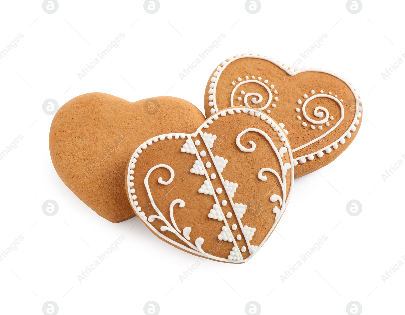 Photo of Tasty heart shaped gingerbread cookies isolated on white, above view