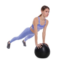 Photo of Athletic woman doing exercise with medicine ball isolated on white