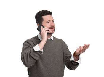 Handsome bearded businessman talking on smartphone against white background