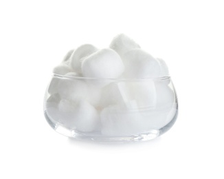 Photo of Balls of fluffy cotton in glass bowl on white background