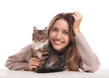 Young woman with cat on white background. Owner and pet