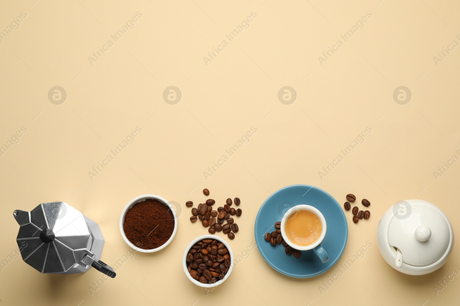 Photo of Flat lay composition with espresso, ground coffee and roasted beans on beige background, space for text