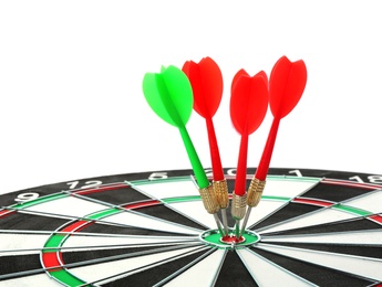 Photo of Dart board with color arrows hitting target, closeup