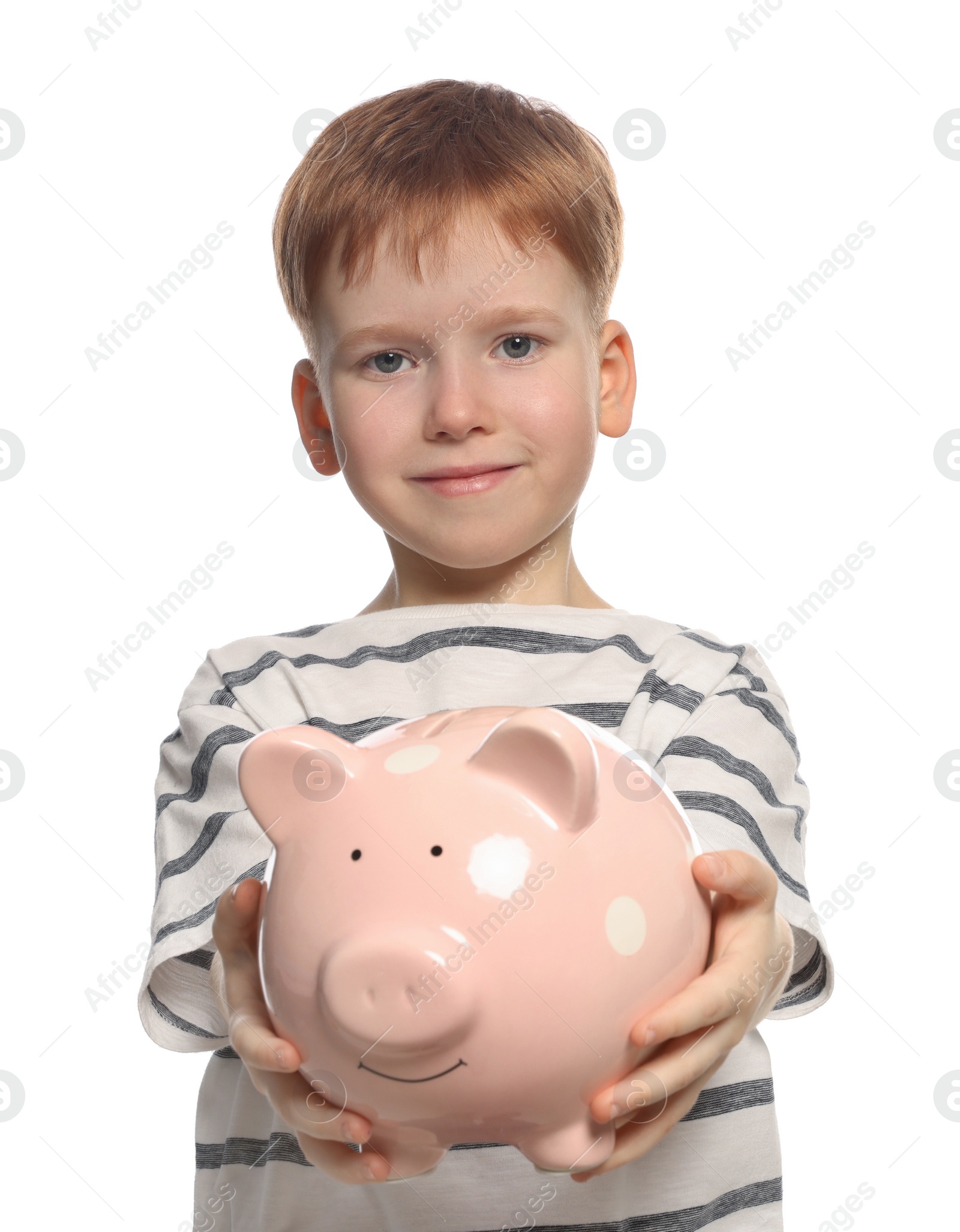 Photo of Cute little boy with ceramic piggy bank on white background