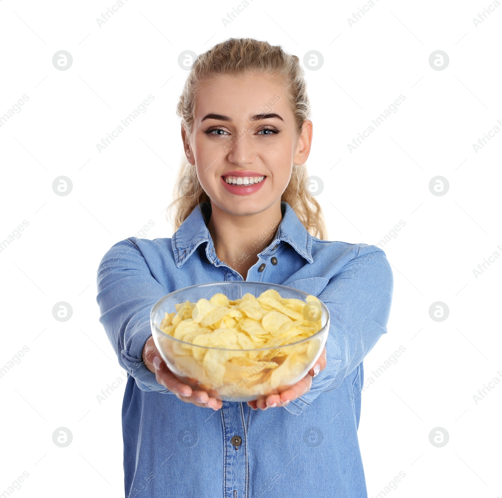 Photo of Woman with bowl of potato chips on white background