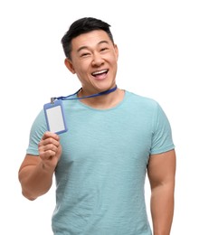 Happy asian man with vip pass badge on white background