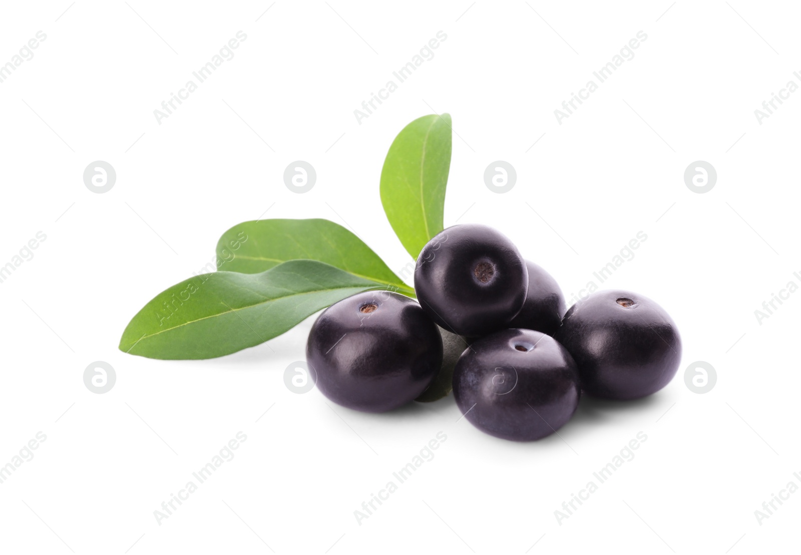 Photo of Fresh acai berries with leaves isolated on white