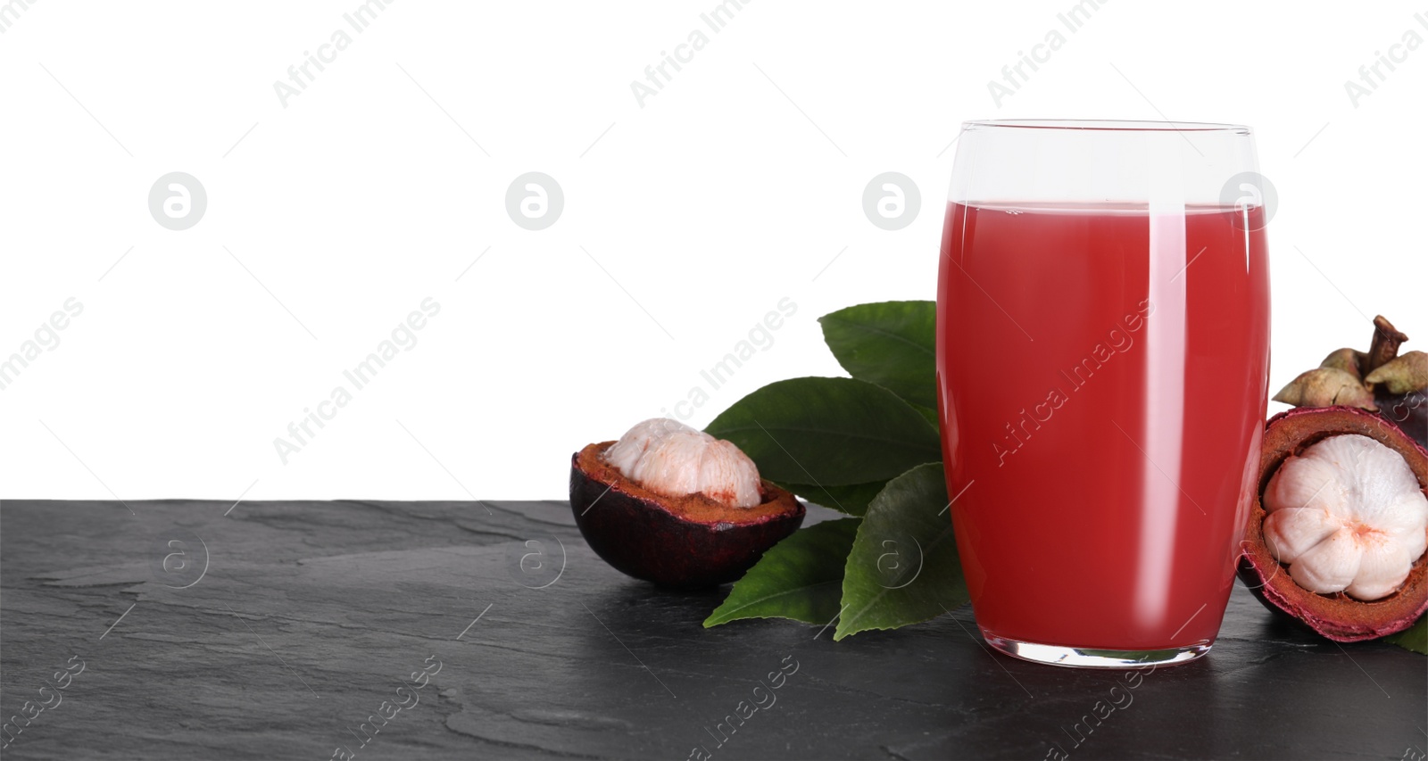 Photo of Delicious mangosteen juice and fresh fruits on black table against white background. Space for text