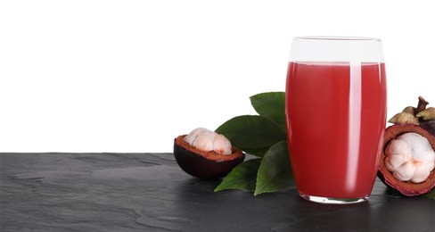 Photo of Delicious mangosteen juice and fresh fruits on black table against white background. Space for text