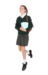 Photo of Teenage girl in stylish school uniform on white background