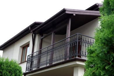 Exterior of beautiful building with empty balcony