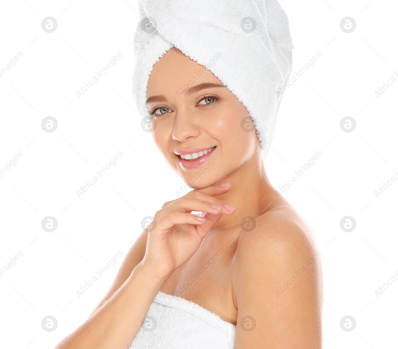 Photo of Portrait of young pretty woman with towels on white background