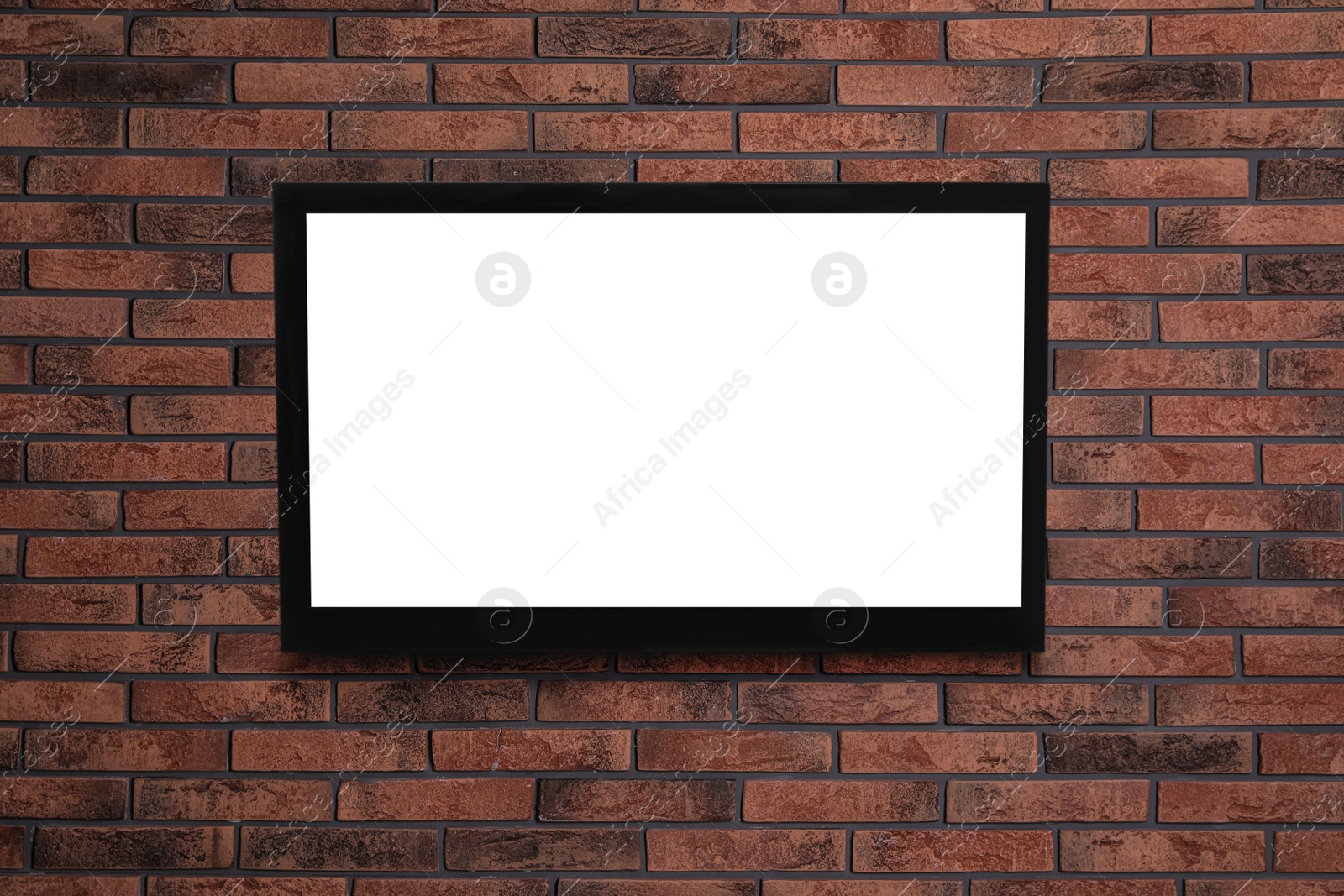 Image of Modern TV on brick wall. Space for design