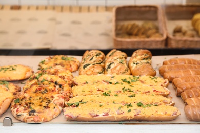 Fresh pastries on counter in bakery store