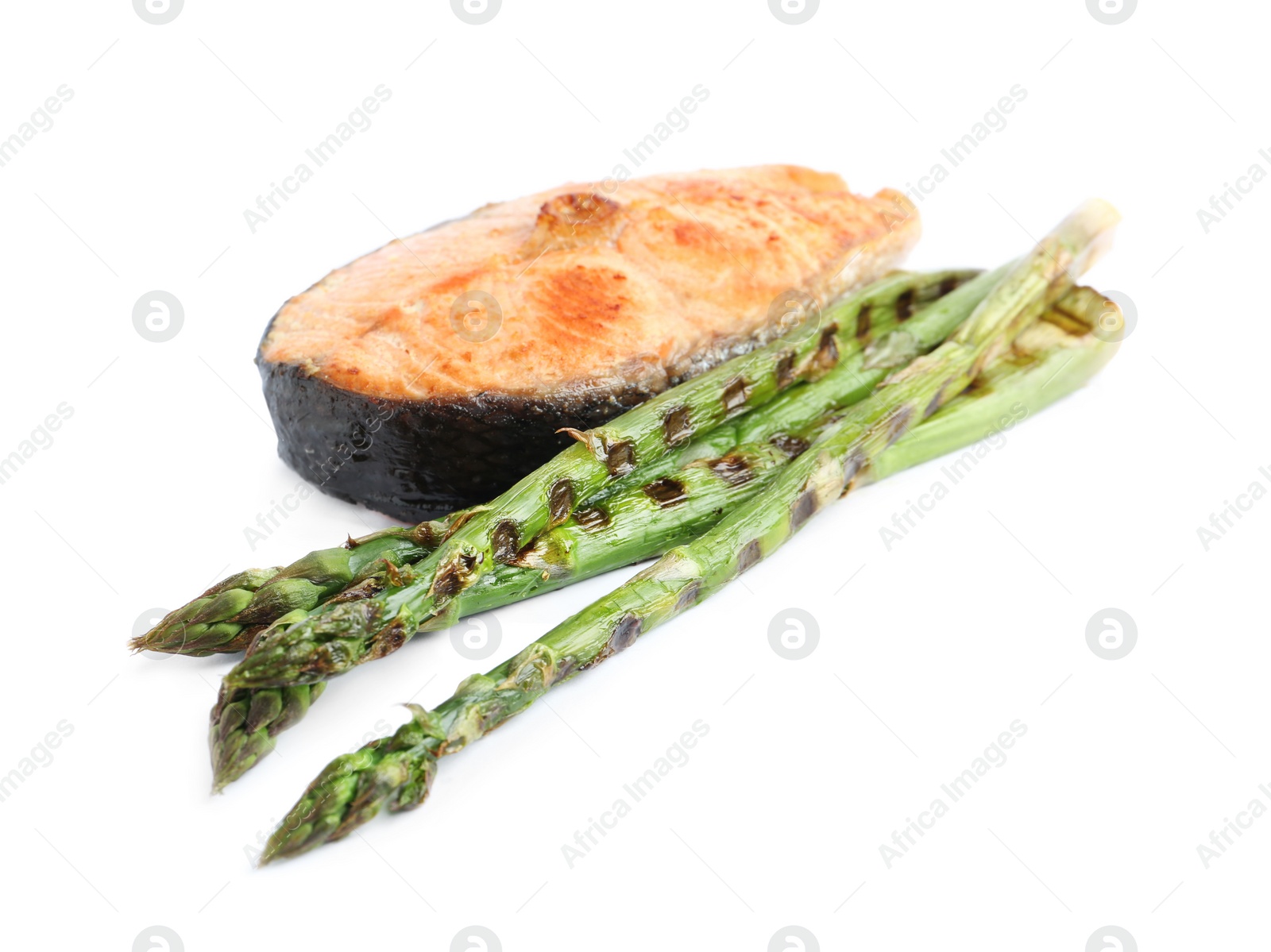 Photo of Tasty salmon steak with asparagus isolated on white