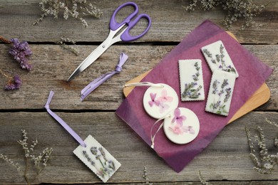 Flat lay composition with scented sachets on wooden table