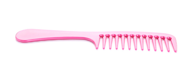 Photo of New pink hair comb isolated on white