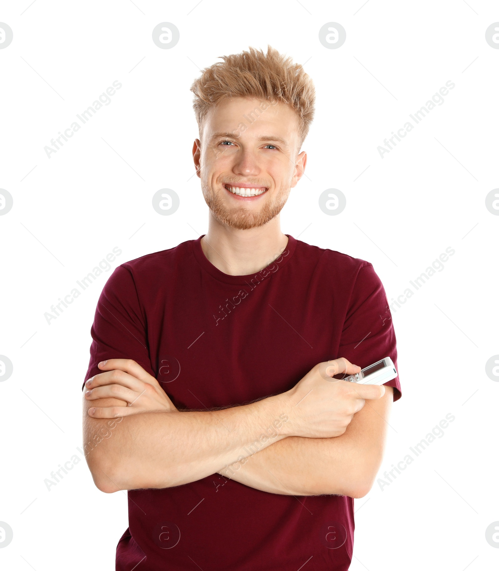 Photo of Young man with air conditioner remote on white background