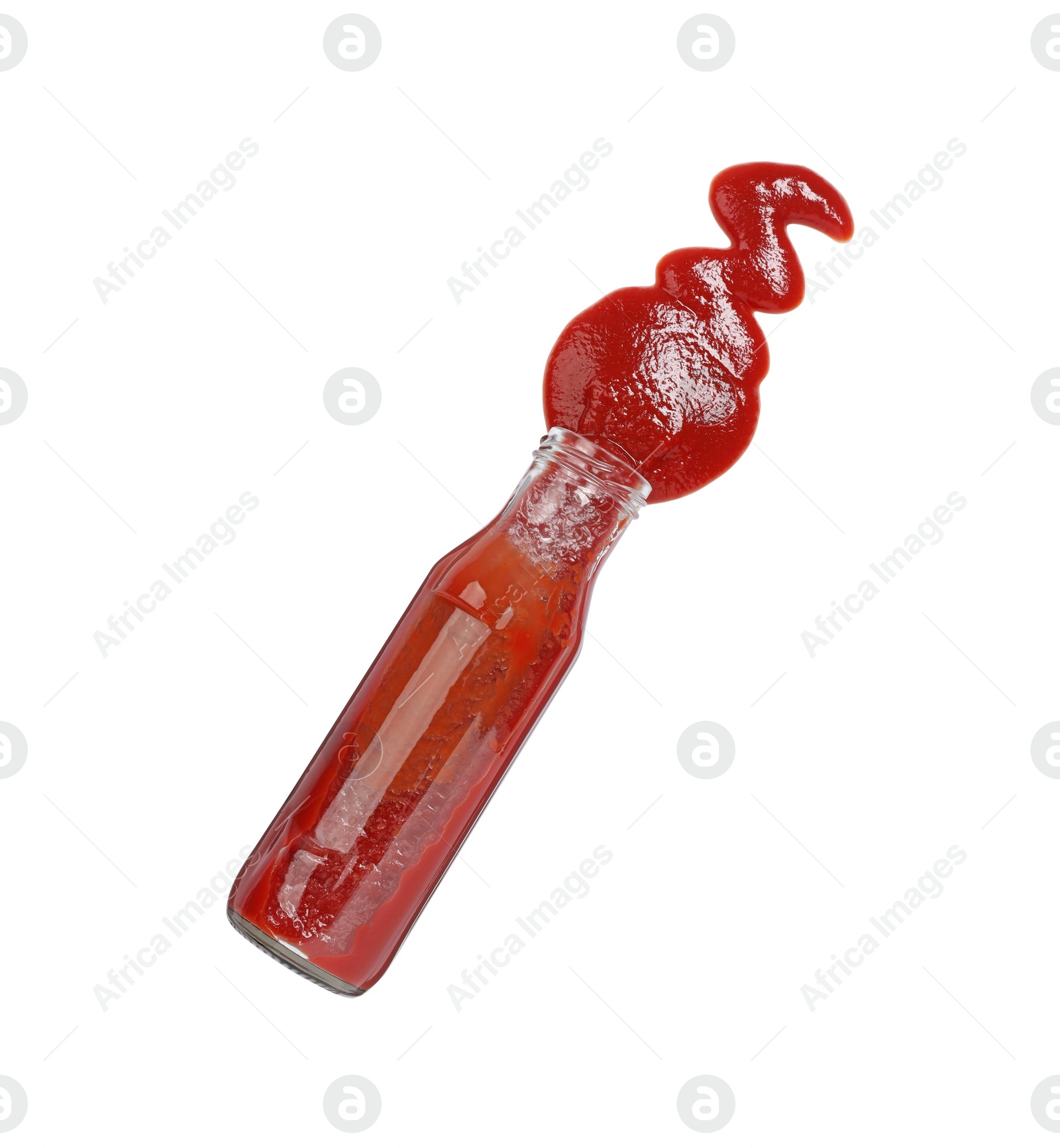 Photo of Ketchup and glass bottle isolated on white, top view