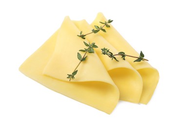 Photo of Slices of tasty fresh cheese and thyme isolated on white