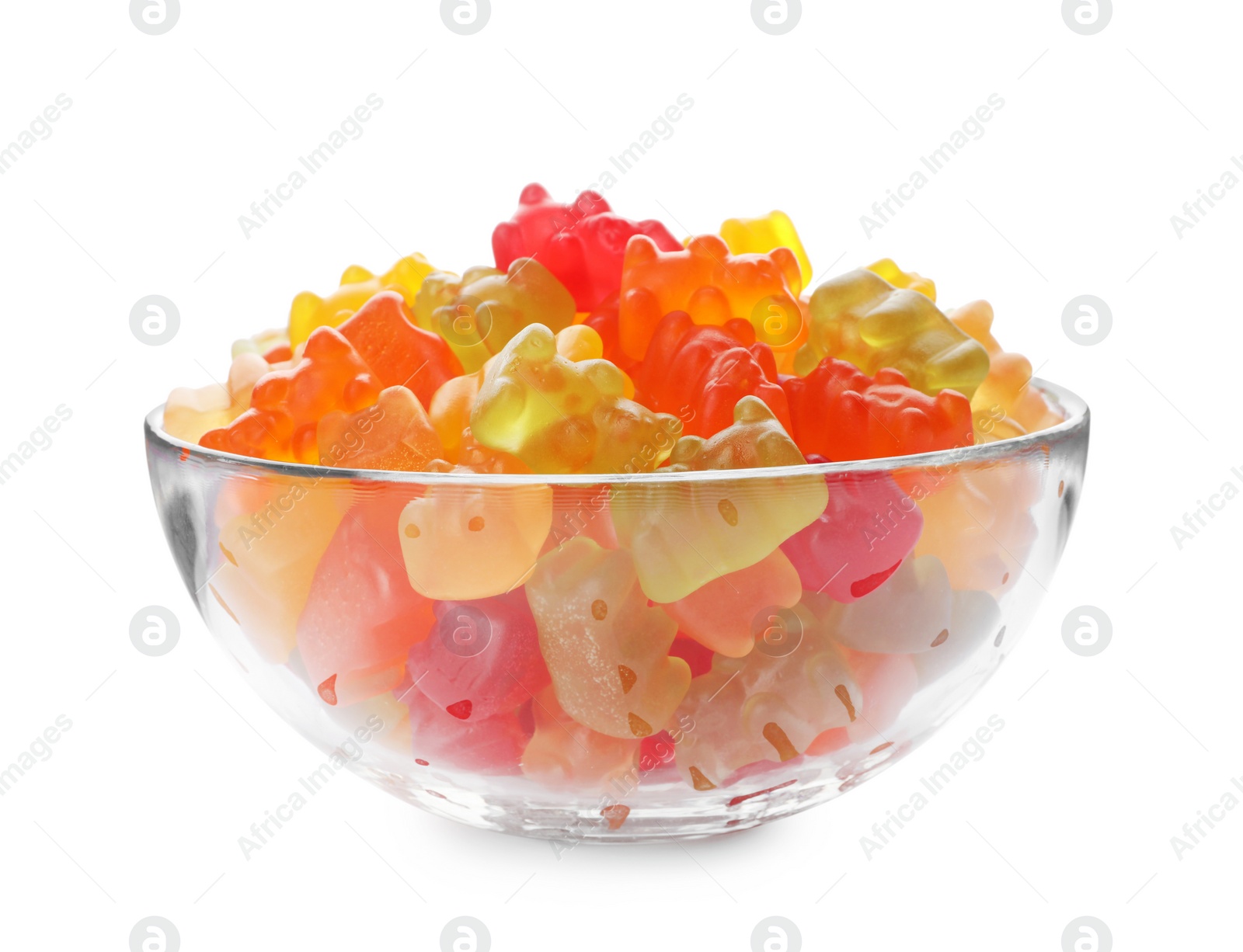 Photo of Glass bowl with delicious bright jelly bears on white background