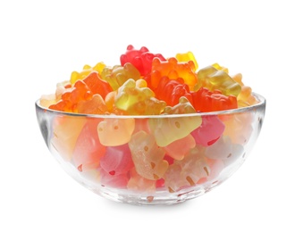 Photo of Glass bowl with delicious bright jelly bears on white background