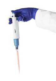 Laboratory analysis. Scientist holding micropipette on white background, closeup