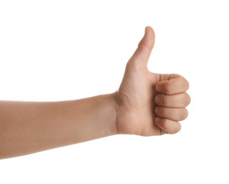 Photo of Teenage boy showing thumb up on white background, closeup