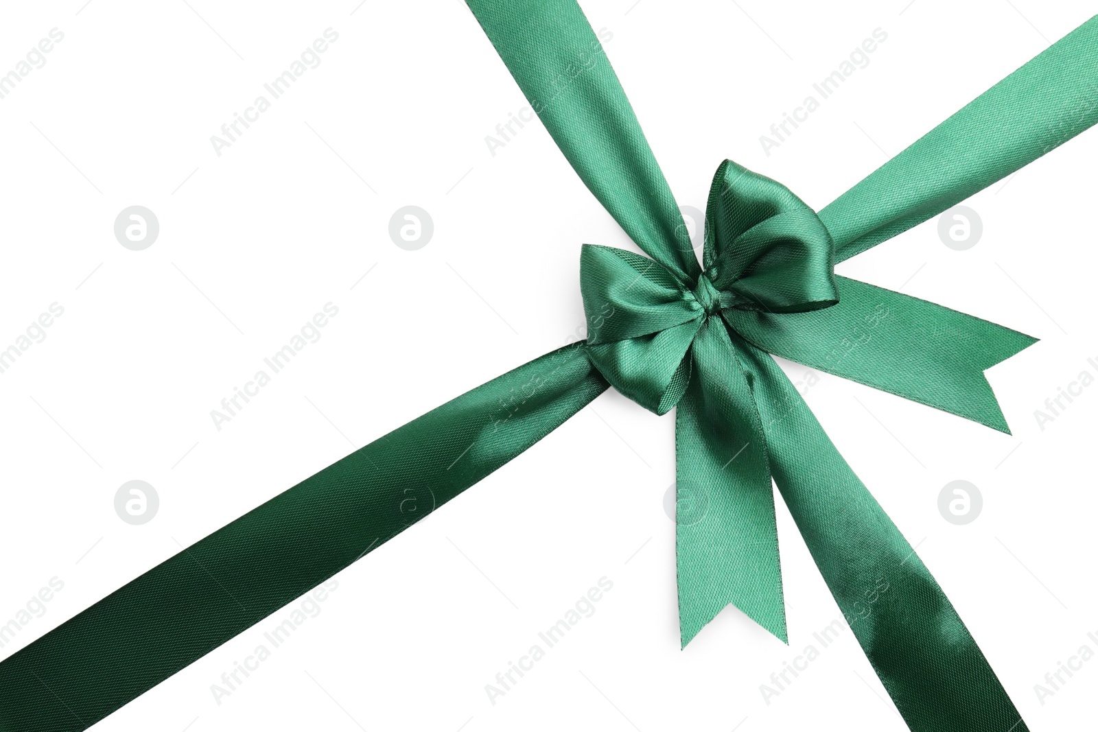 Photo of Green satin ribbon with bow isolated on white, top view