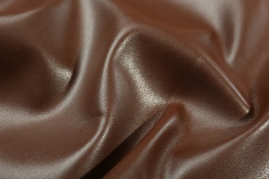 Photo of Brown natural leather as background, above view