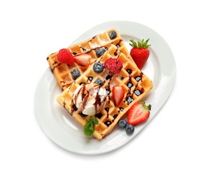 Photo of Plate with yummy waffles, berries and ice cream on white background, top view