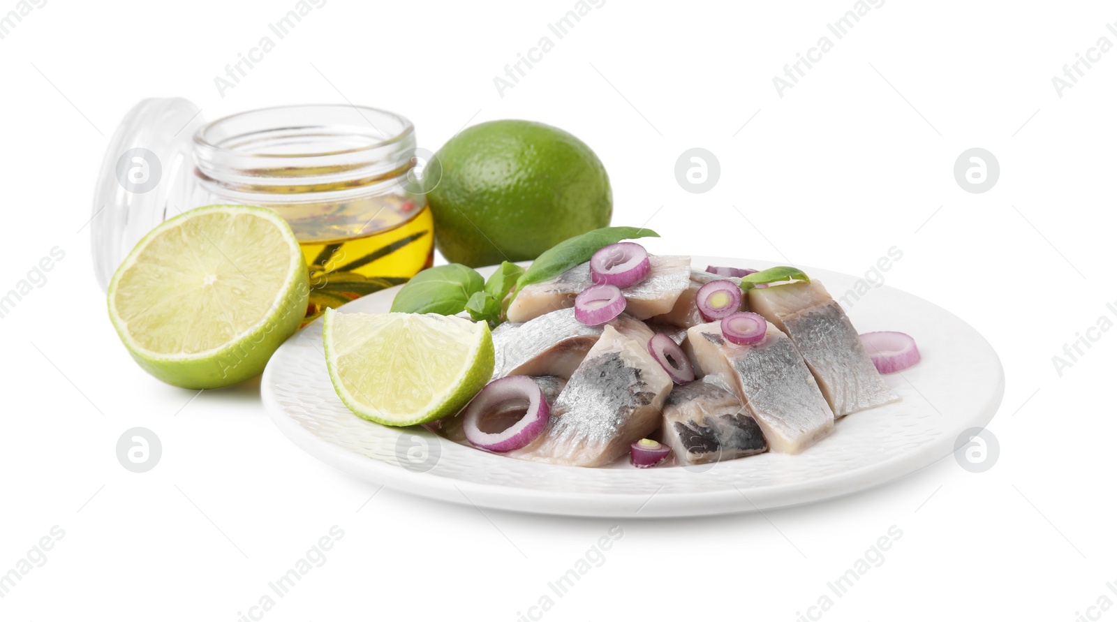 Photo of Plate with tasty fish, marinade and lime isolated on white