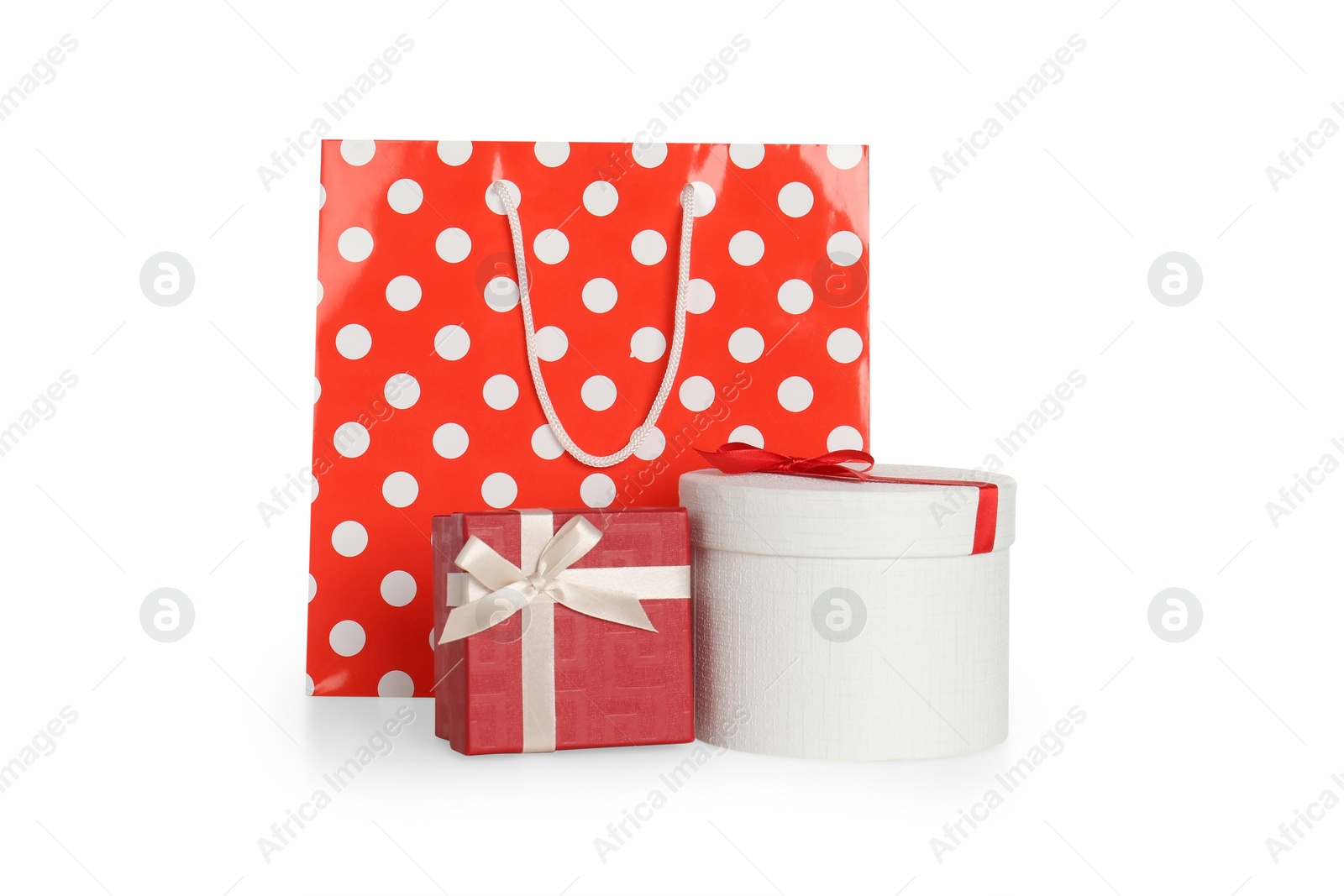 Photo of Paper bags and gift boxes isolated on white