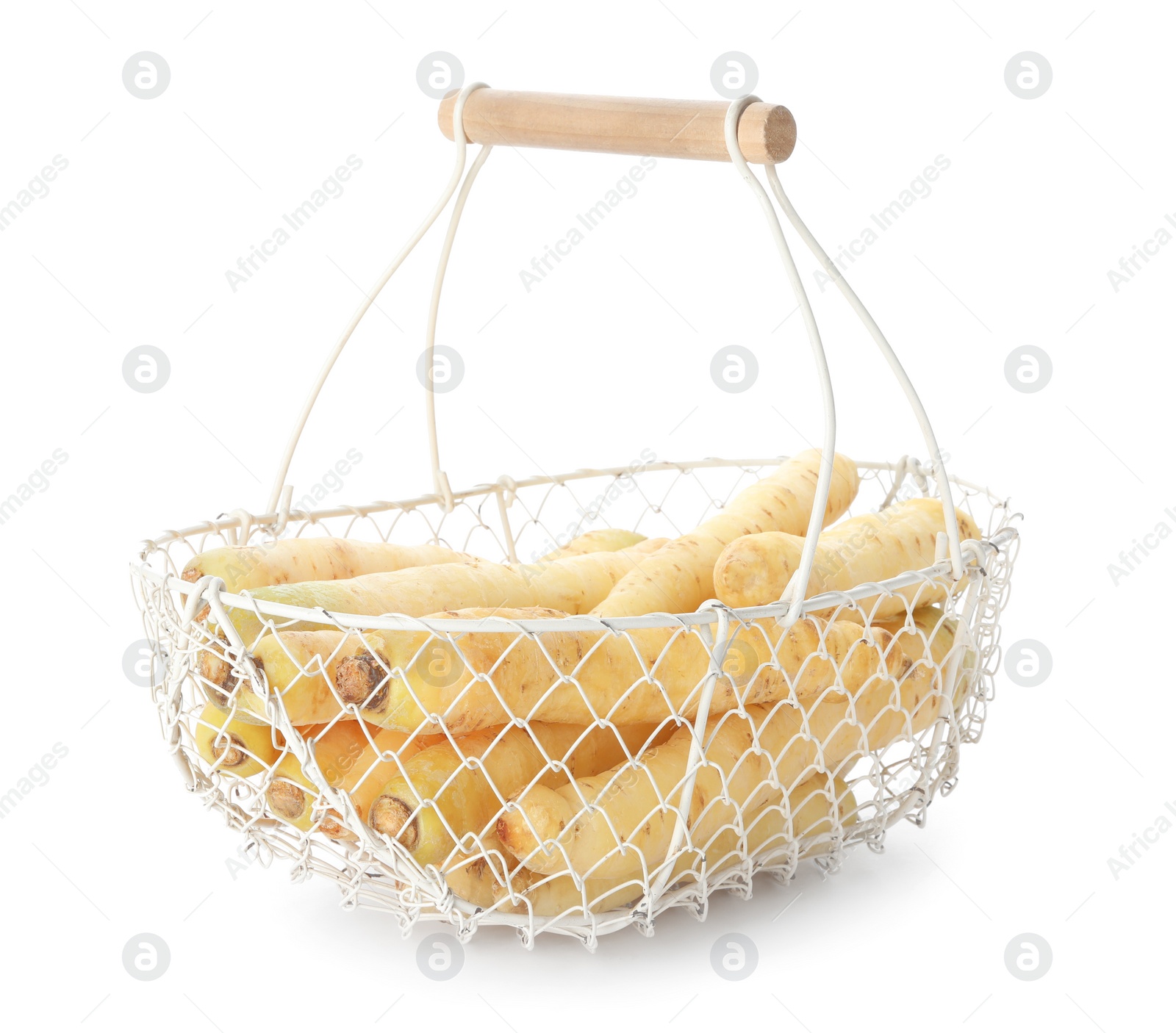 Photo of Raw carrots in metal basket isolated on white