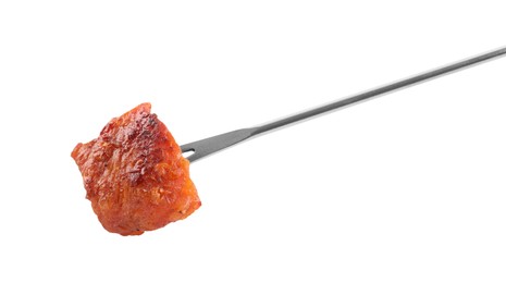 Fondue fork with piece of fried meat isolated on white