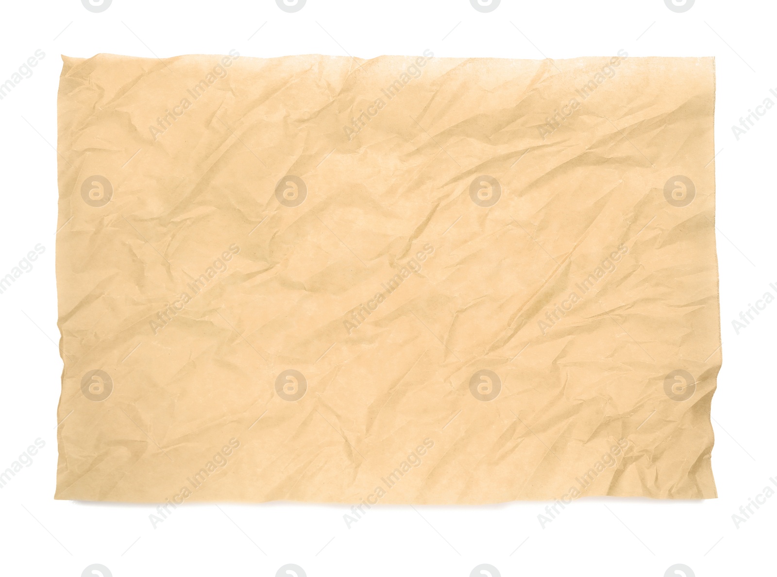 Photo of Sheet of crumpled brown baking paper on white background, top view