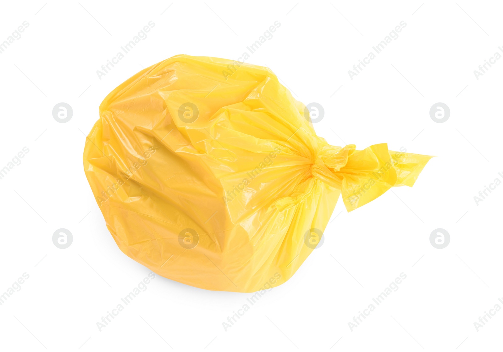 Photo of Yellow plastic garbage bag isolated on white