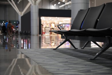 Waiting area with seats in airport terminal