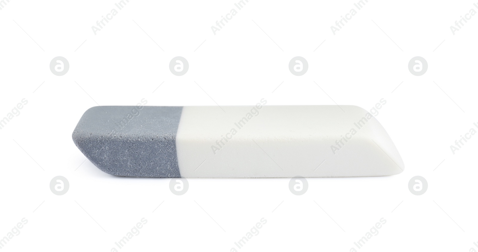 Photo of New double eraser isolated on white. School stationery