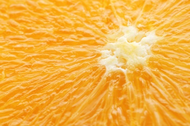 Photo of Fresh juicy orange fruit slice, closeup view